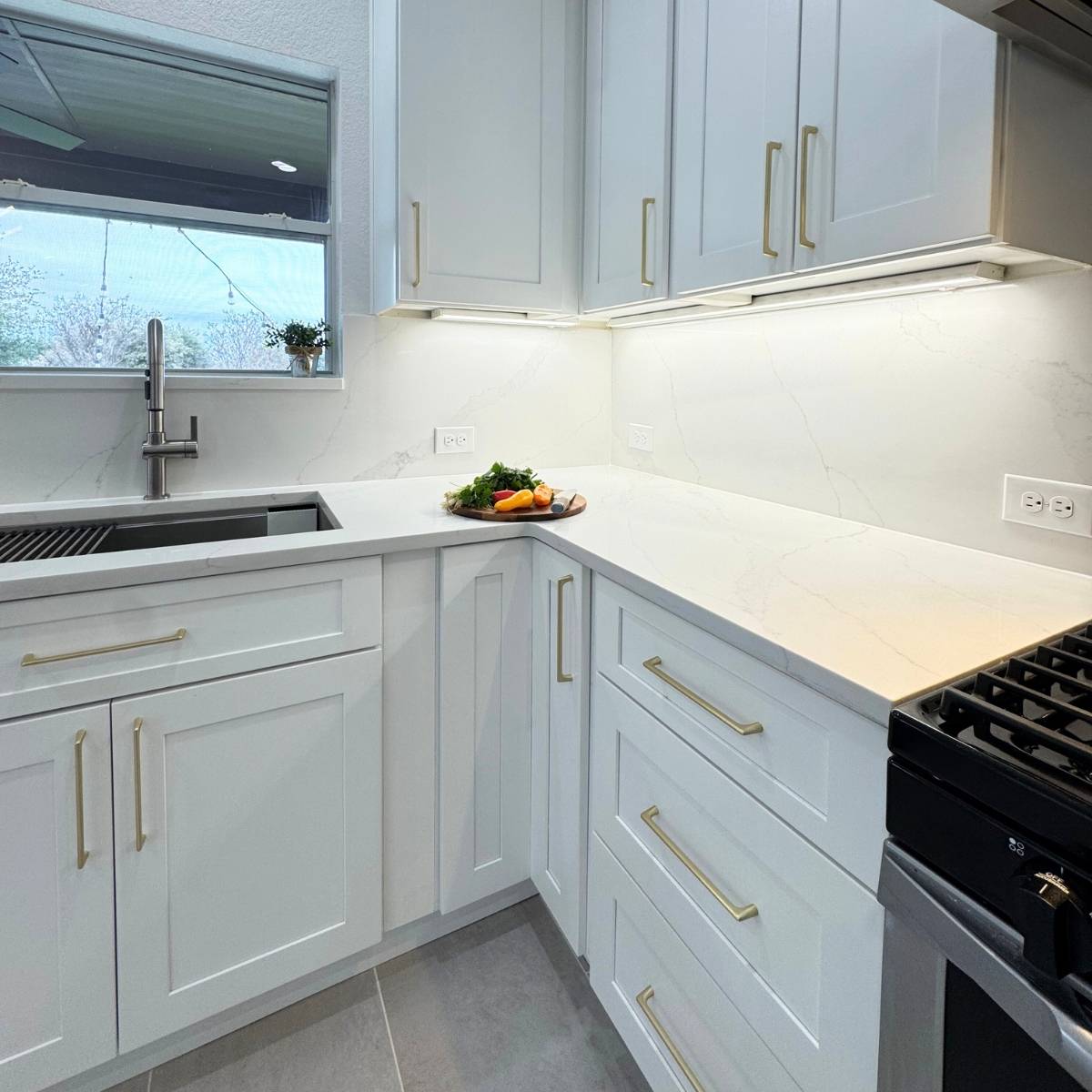 After: Bright modern Austin kitchen renovation with white cabinets