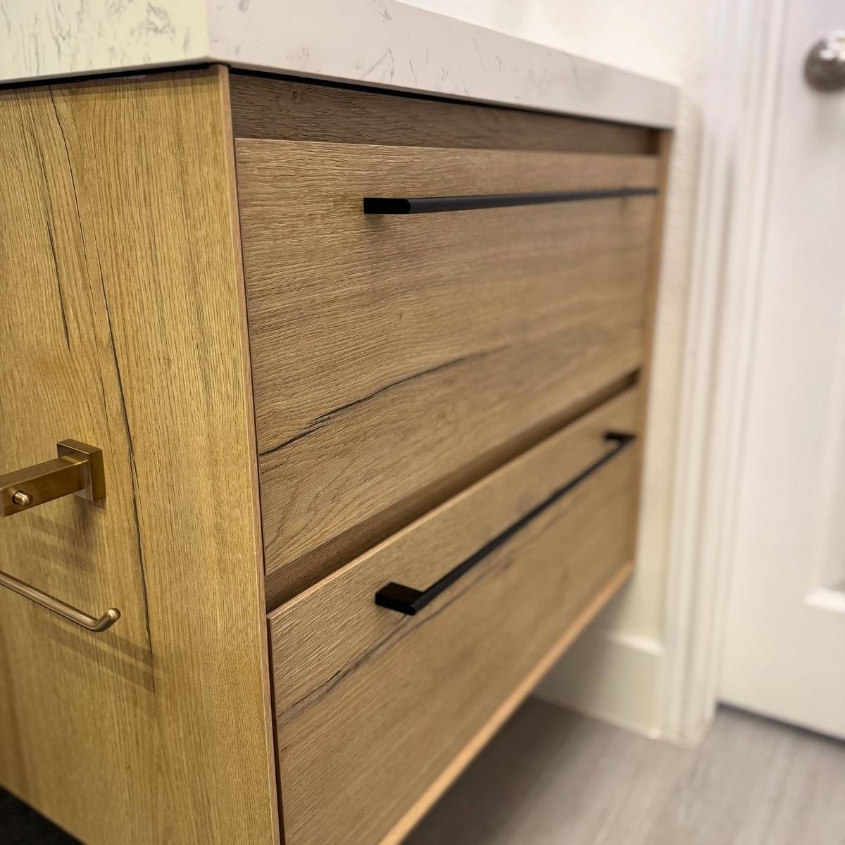Updated bathroom wood floating vanity after remodel in Austin