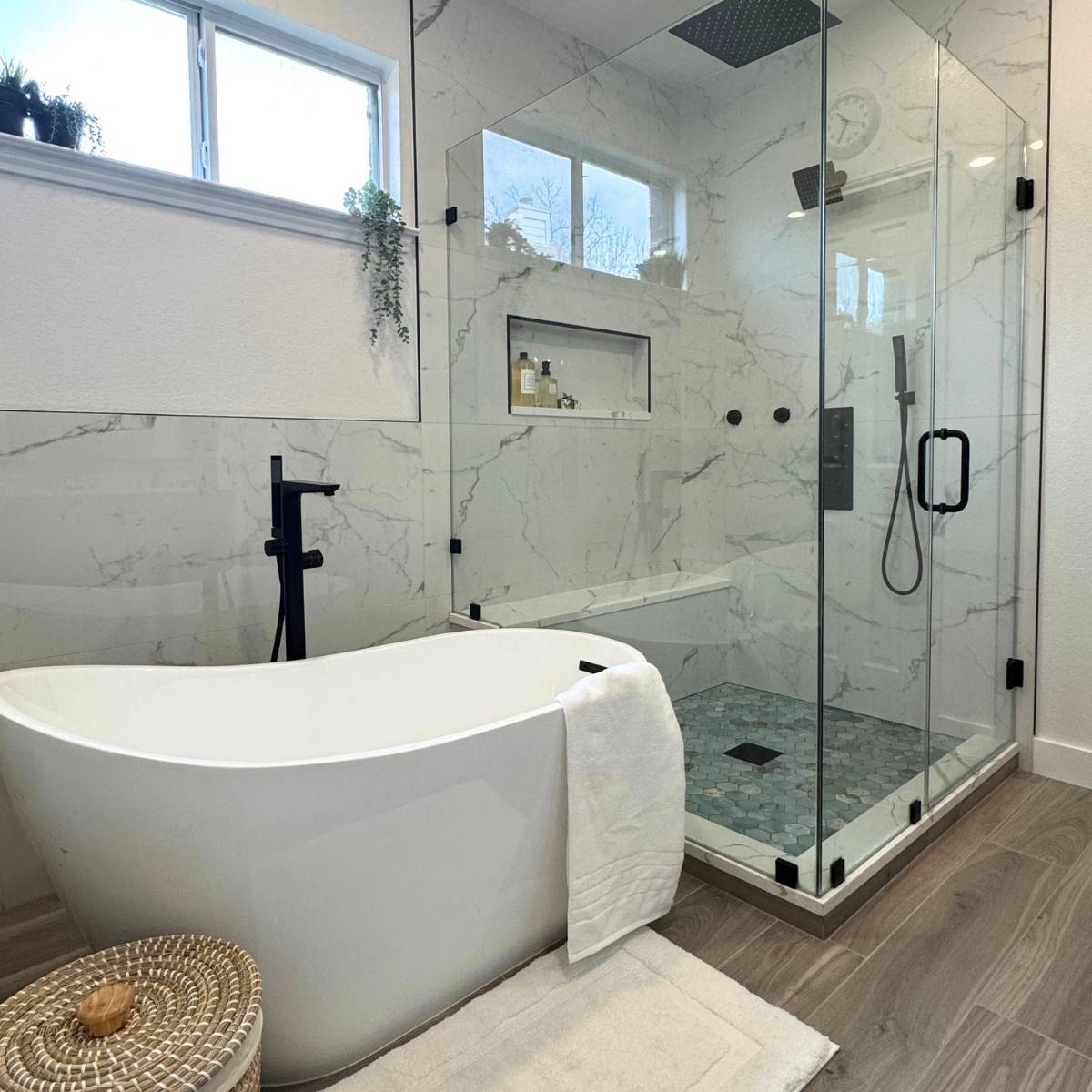  Austin luxury primary bathroom after renovation with freestanding tub and walk-in shower