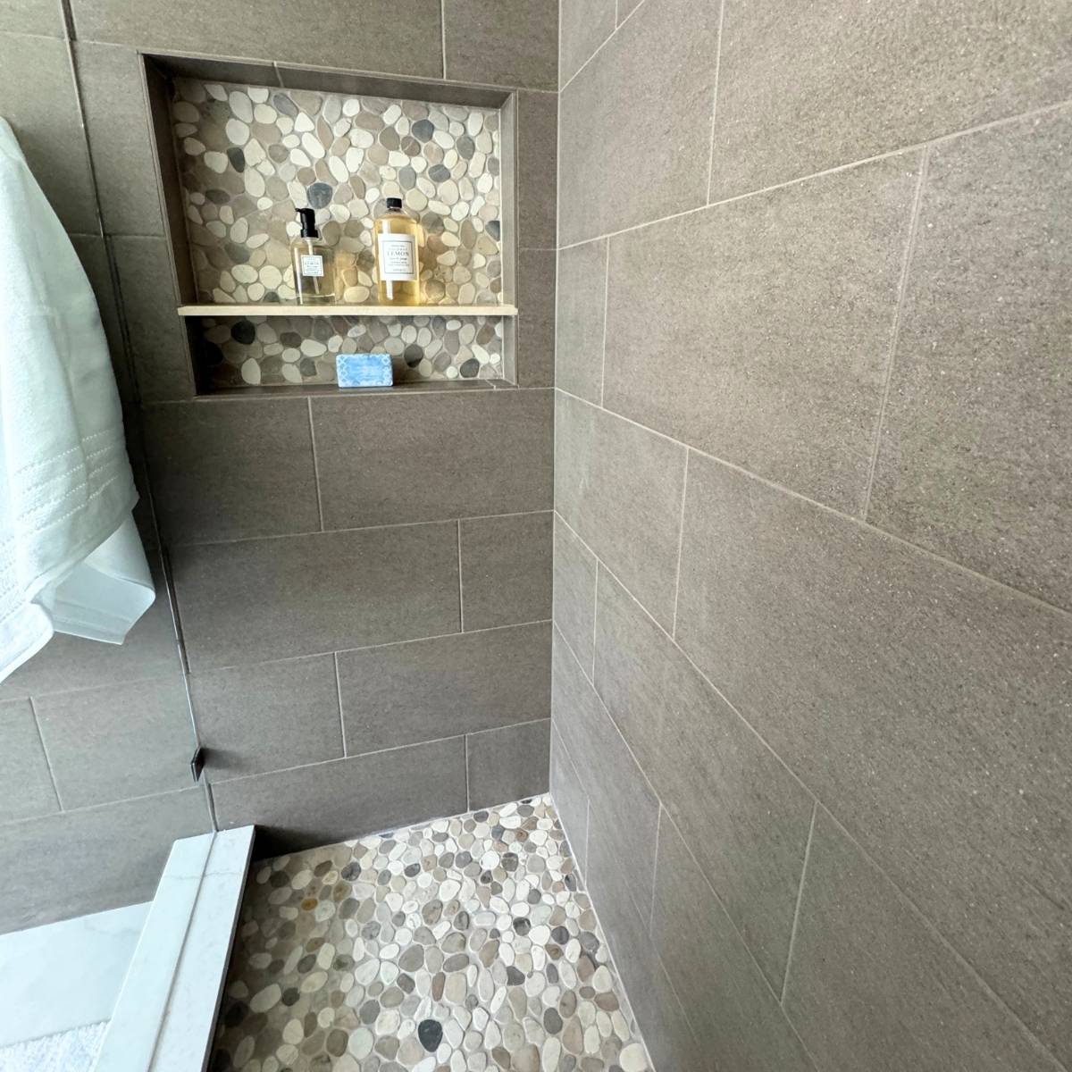 master bathroom remodel Austin Texas with spacious walk in shower with custom tile and custom niche