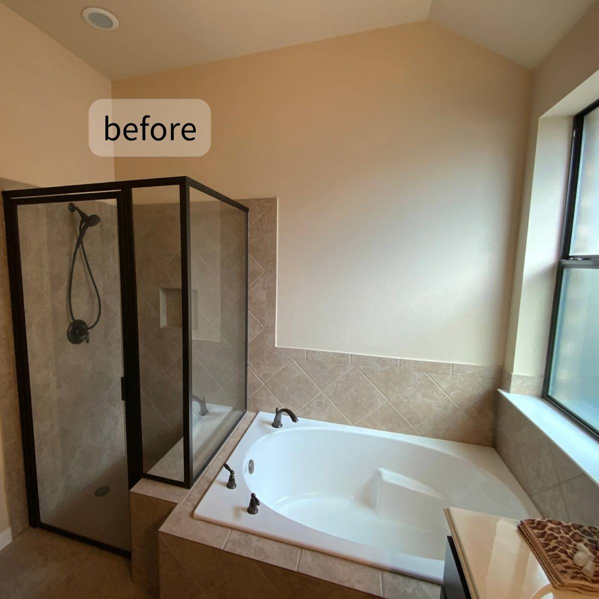 aging bathroom before renovation in Austin TX with dated design