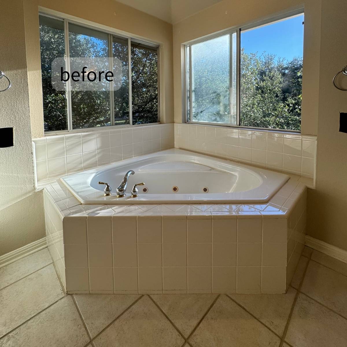 before primary bathroom remodel showing old tile, outdated gold trim and outdated fixtures Austin home