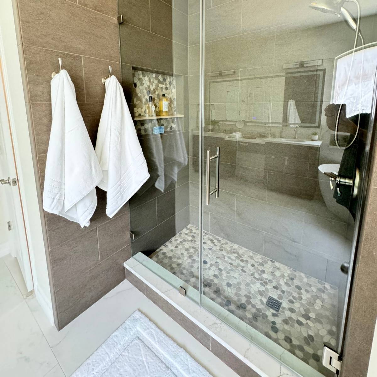 custom primary bathroom renovation Austin Texas with large custom tile walk in shower
