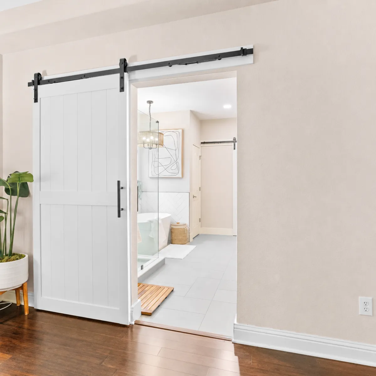 Contemporary Austin primary bath with stunning barn door entrance