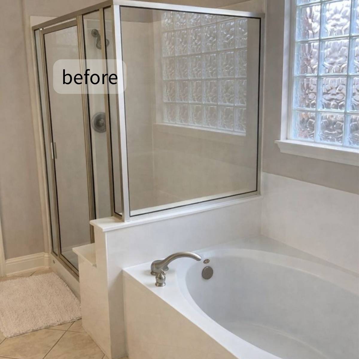 Before: 1980s Austin bathroom remodel candidate - dark tile, outdated tub surround