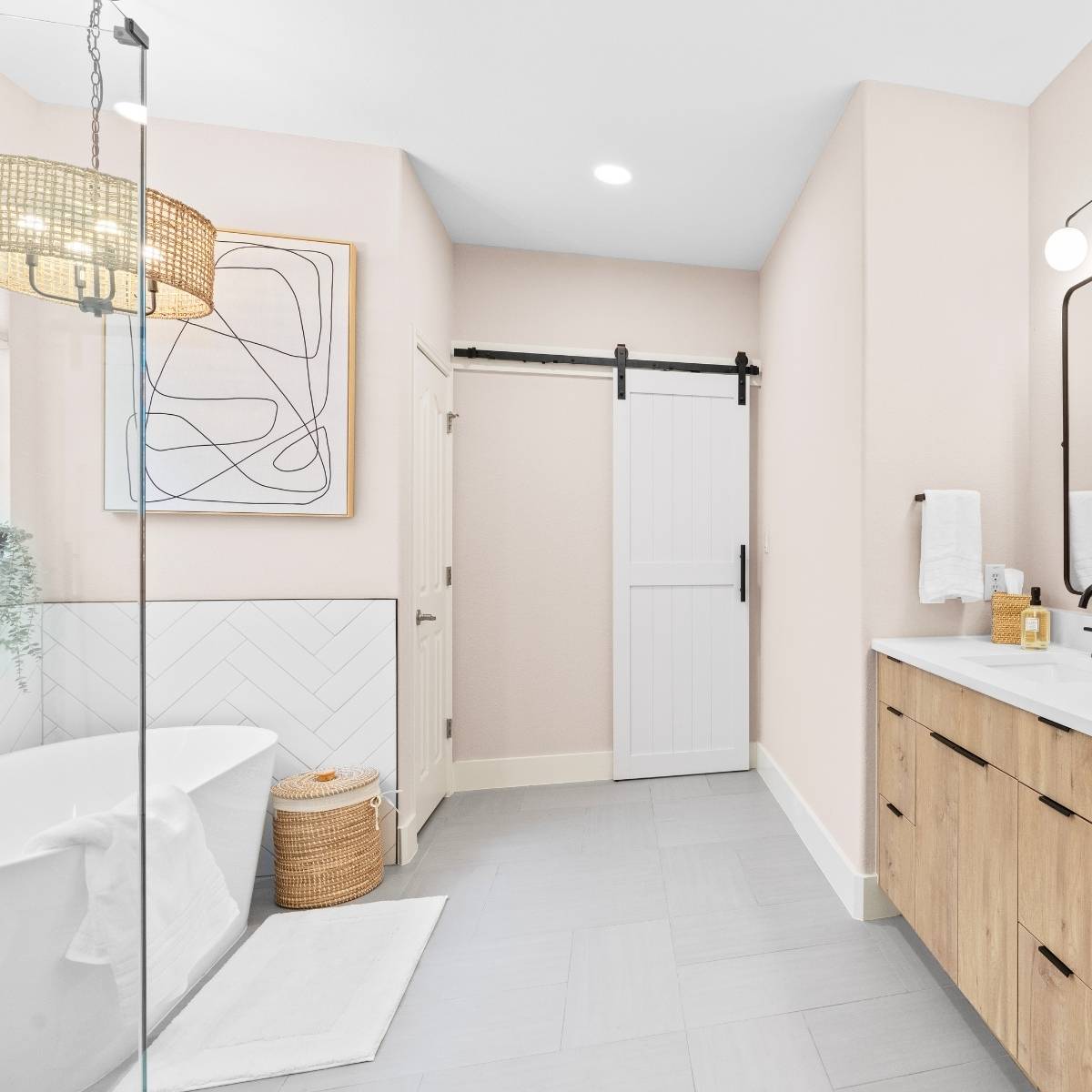 After: Spa-like Austin bathroom remodel with huge glass shower and natural lighting