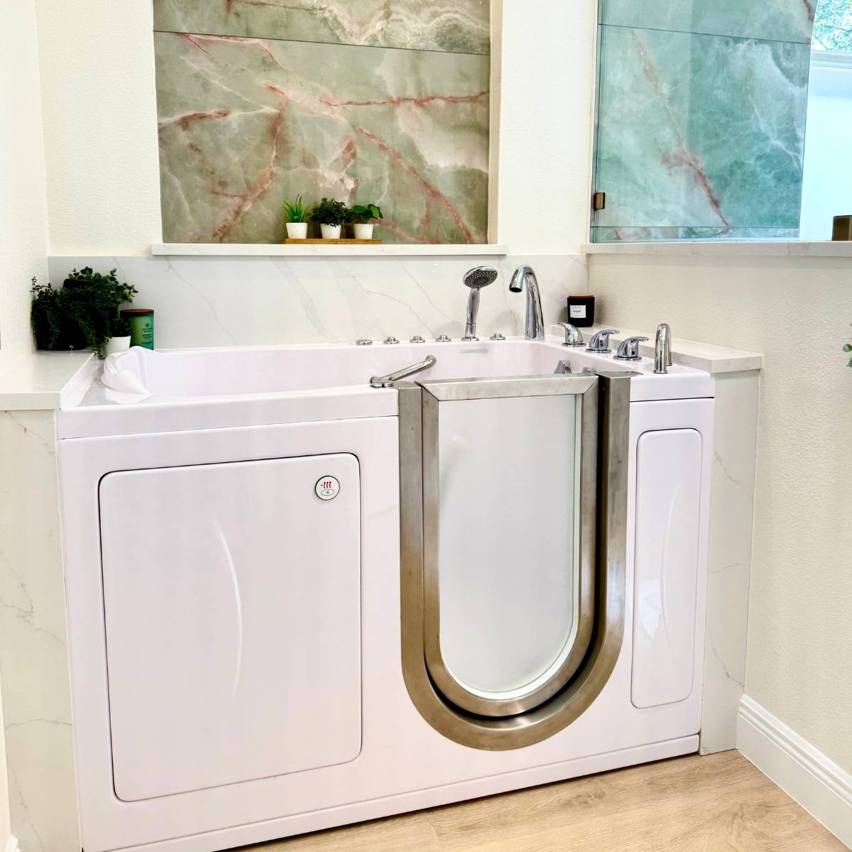 After: Custom aging-in-place Austin bathroom remodel - new cabinets, walk-in tub, beautiful tile