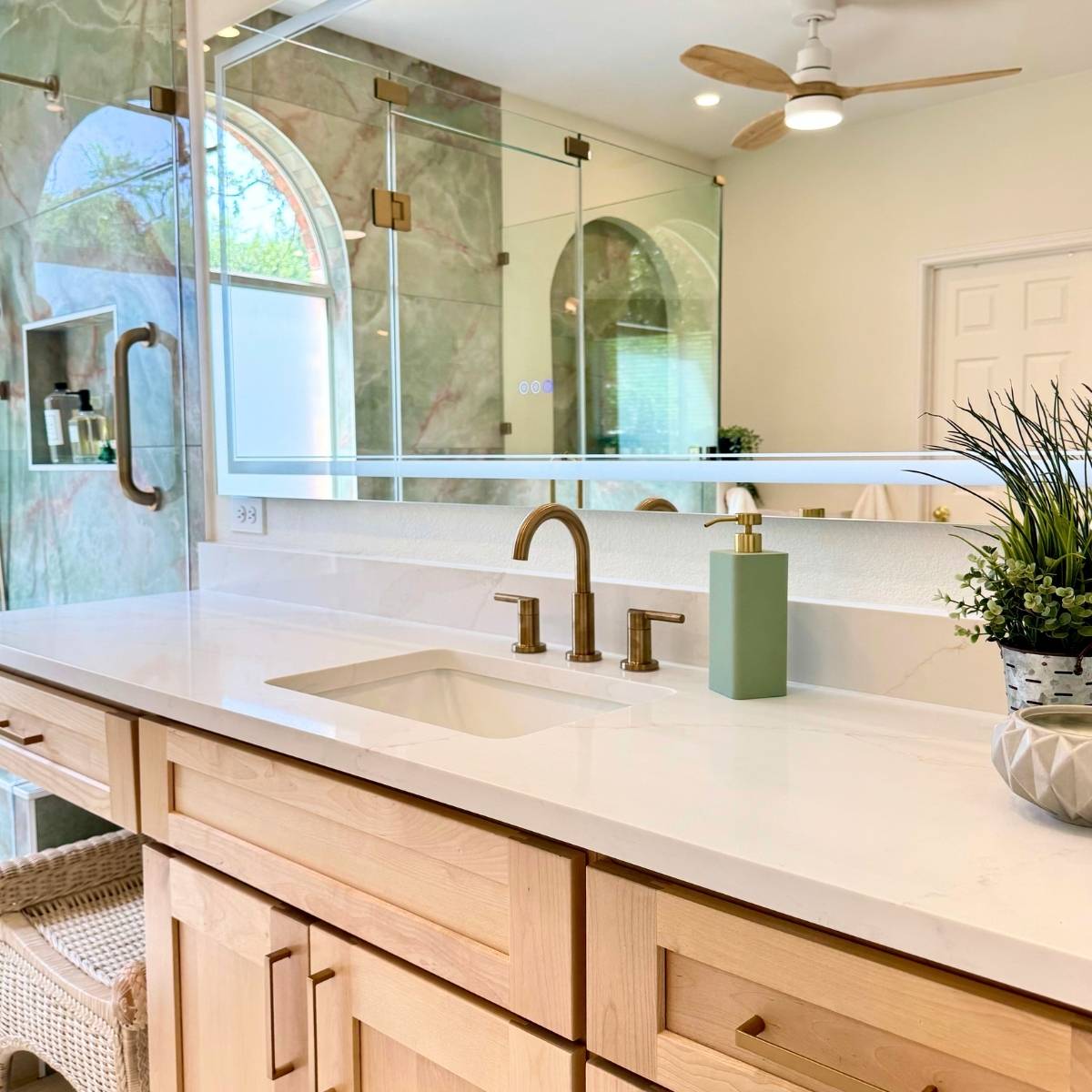 After: Luxury Austin bathroom transformation - custom tile, freestanding vanity & lit mirror