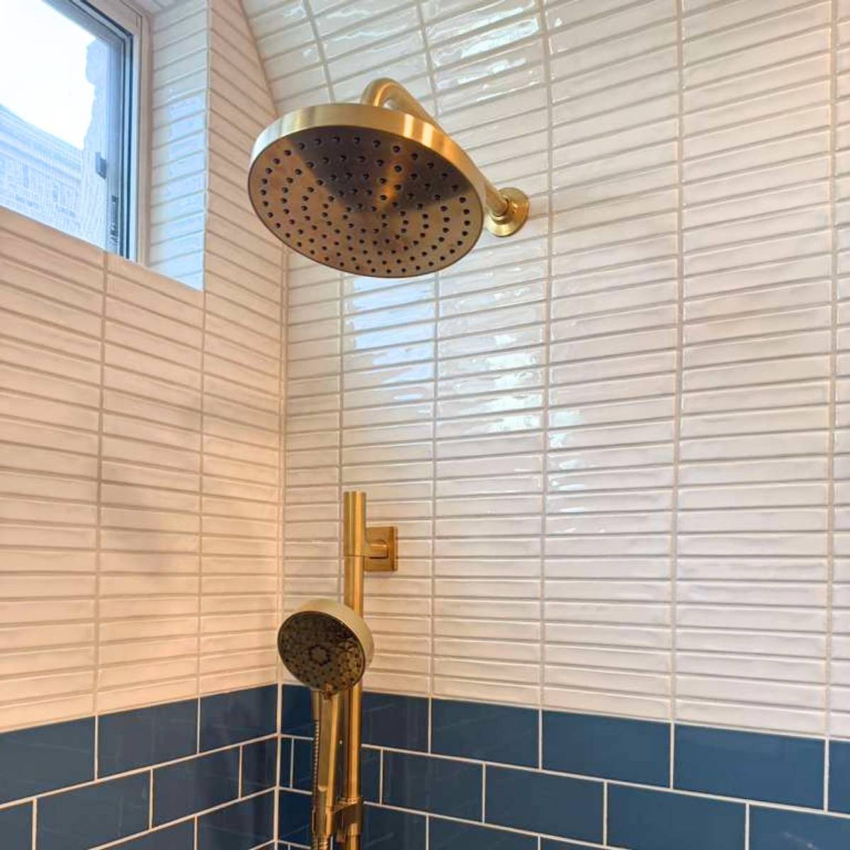 After: Austin bathroom remodel with custom tile work, arched design and beautiful fixtures