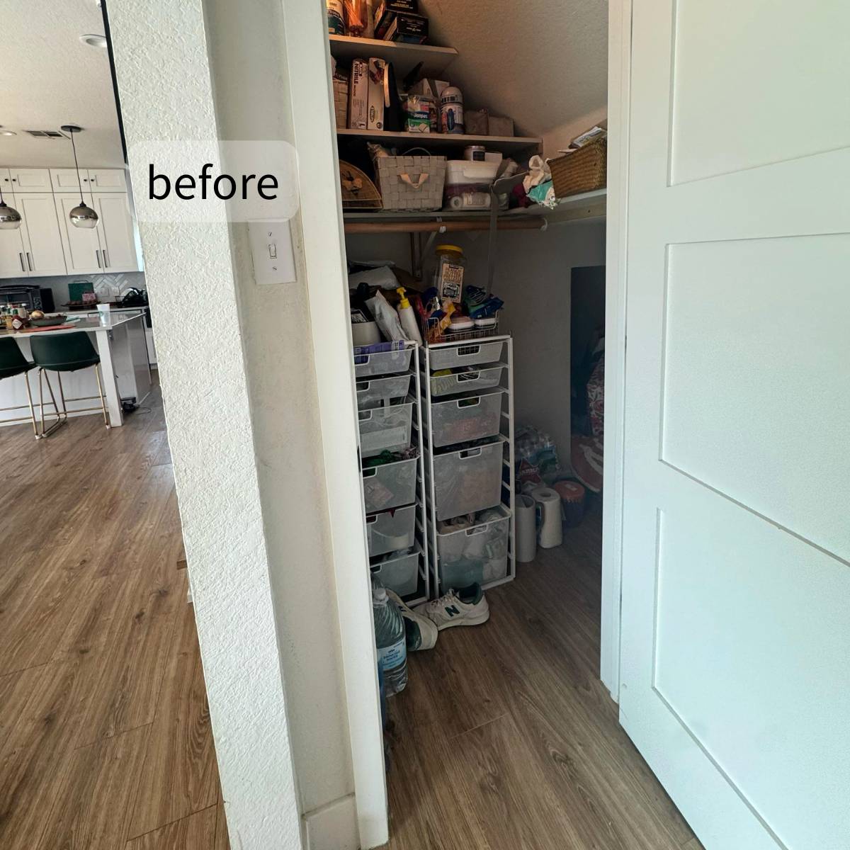 Before: Awkward Under-stair space before custom remodel