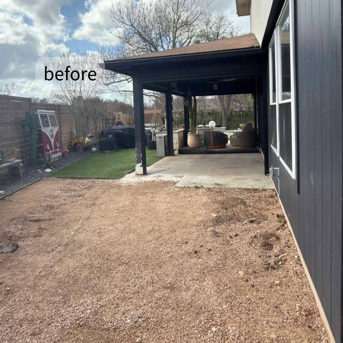 Before outdoor kitchen remodel in Austin TX with covered patio space and backyard area ready for transformation.