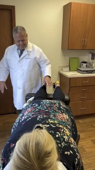 Serene patient experiencing gentle chiropractic care