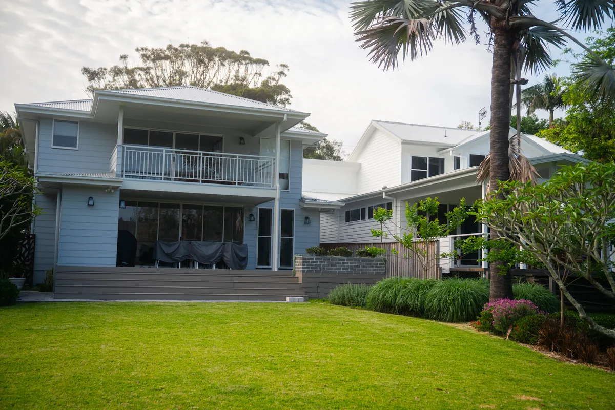 Coastal home with a new lawn and garden beds