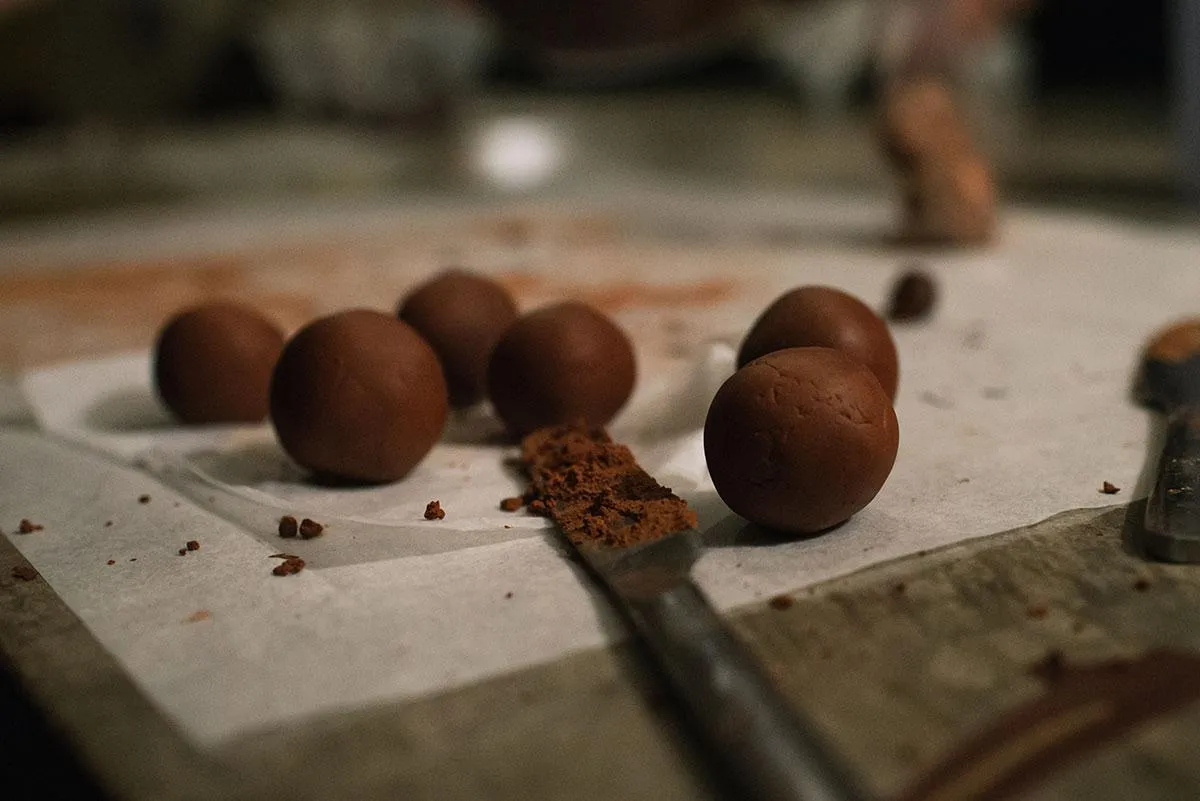 red and yellow lollipop on white surface