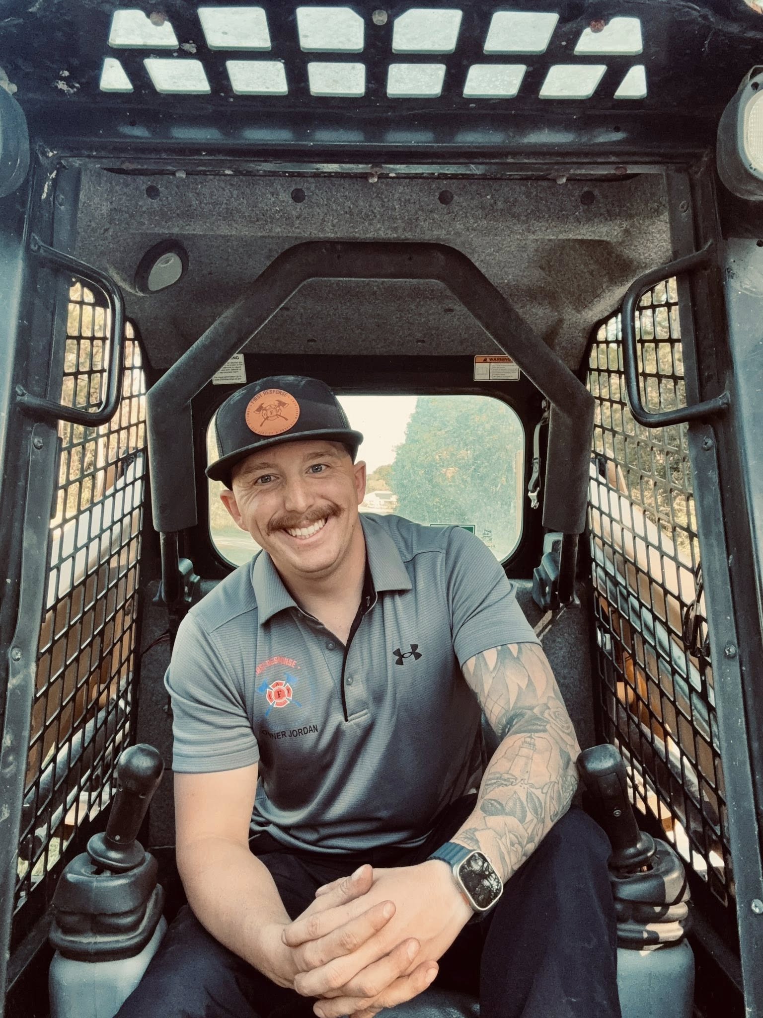 Firefighter-owned home services business owner in uniform at a residential property