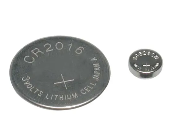 a couple of gauges sitting on top of a rusted train