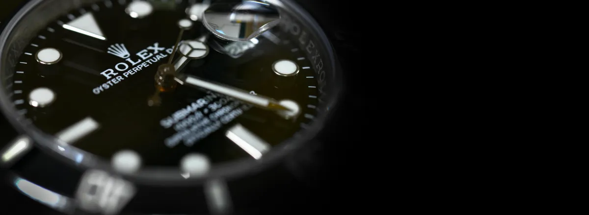 three red, blue, and teal classic cars