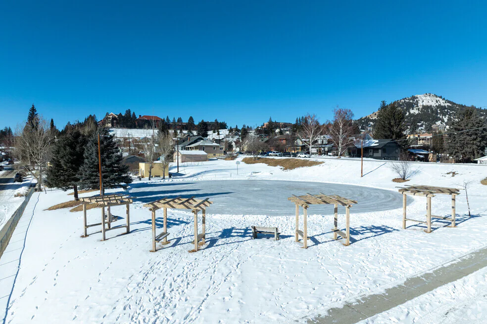 Cedar pergola and backyard deck overlooking hills in Ramsay MT