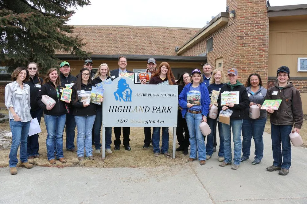 Restored wood porch with railing on home in Highland Park Havre MT