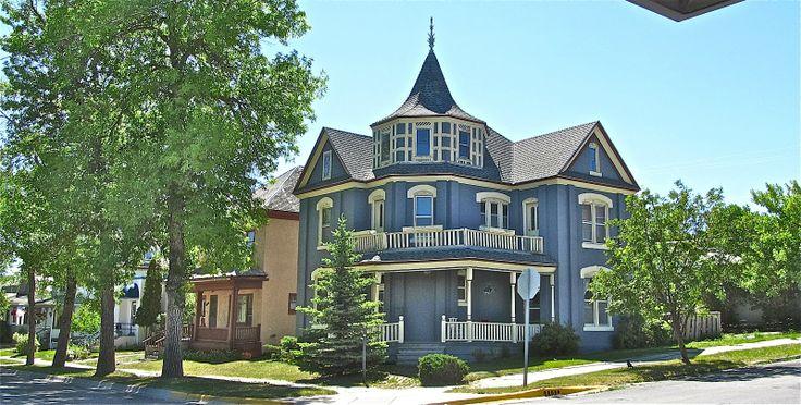 Restored porch with classic railing on Mansion District home in Helena MT