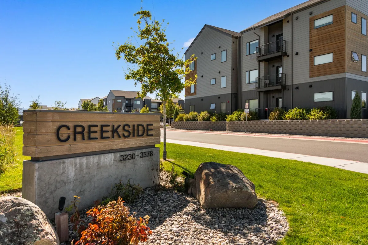 Modern composite deck with privacy screen in Creekside Kalispell