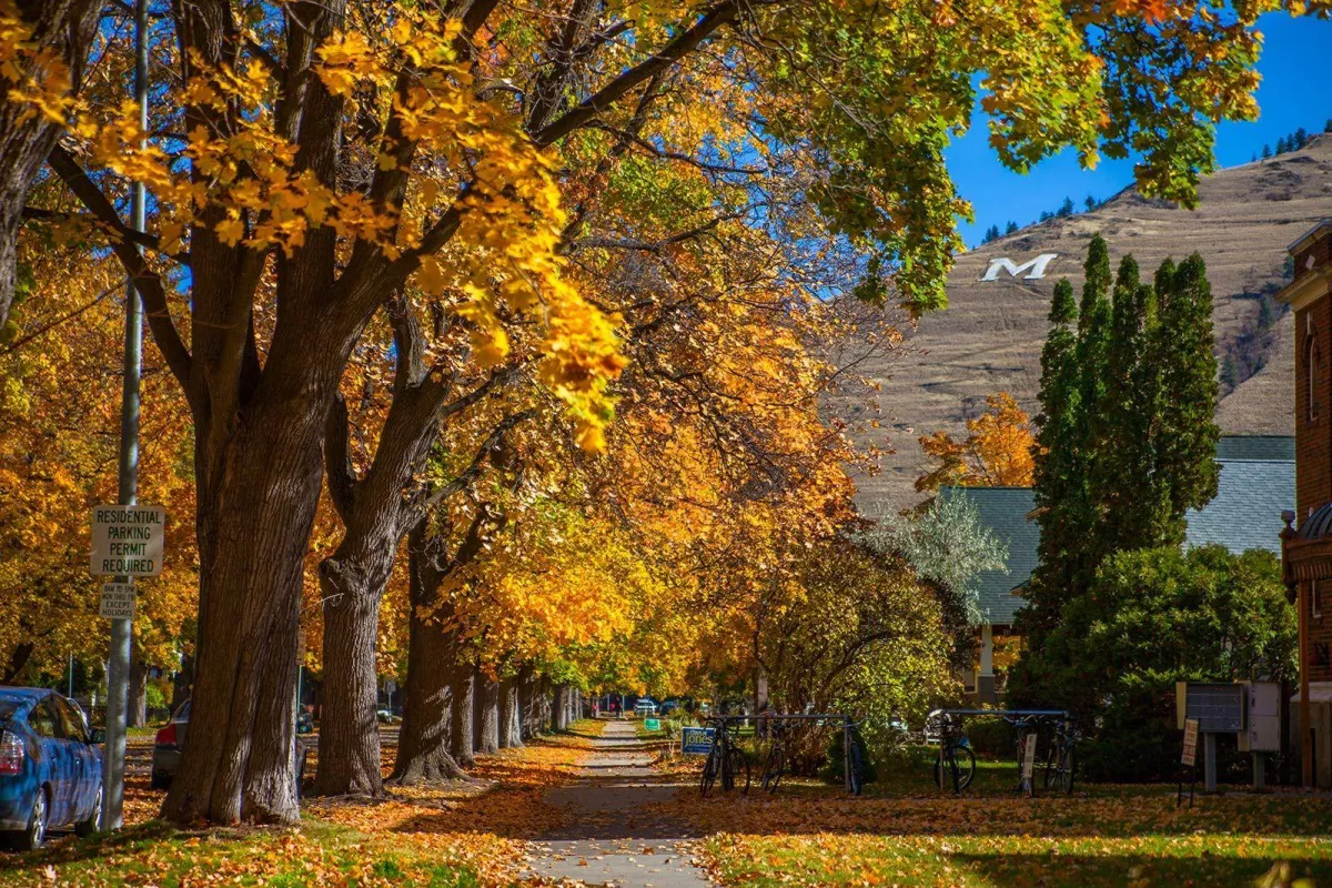 Restored front porch with matching railings in Missoula’s University District