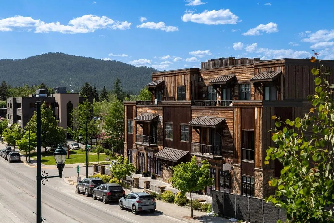 Restored porch with updated railing on downtown Whitefish home