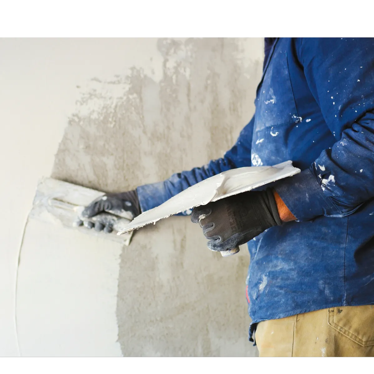 man applying stucco 