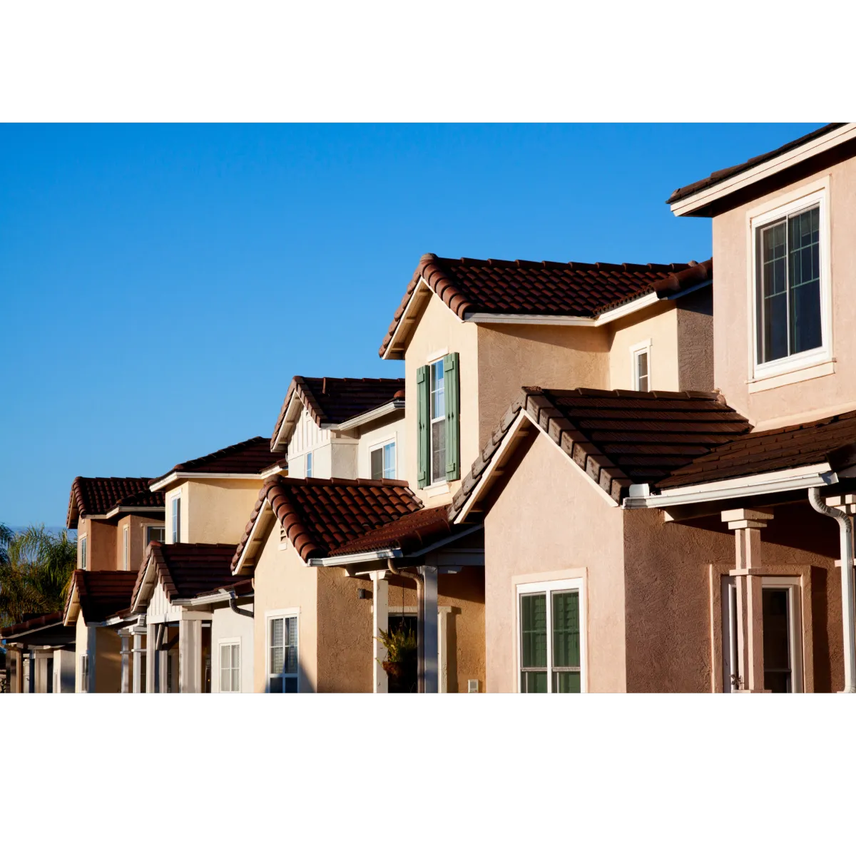 condo complex with pink stucco