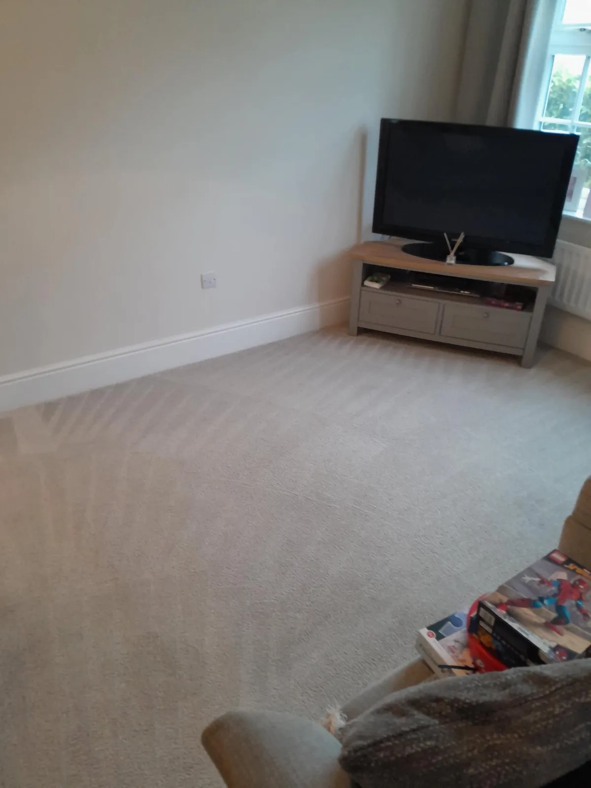 Lounge carpet after being professionally cleaned by Dragon Carpet Cleaning