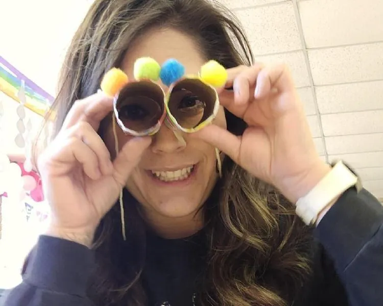 Girl follows directions during arts and crafts time.