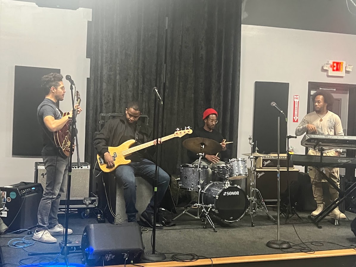 Graffiti art with colorful "future is creative" stickers.