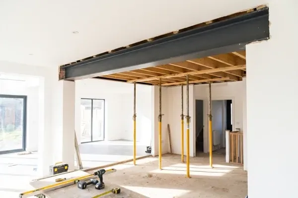 Steel support beam installed where a load-bearing wall was removed