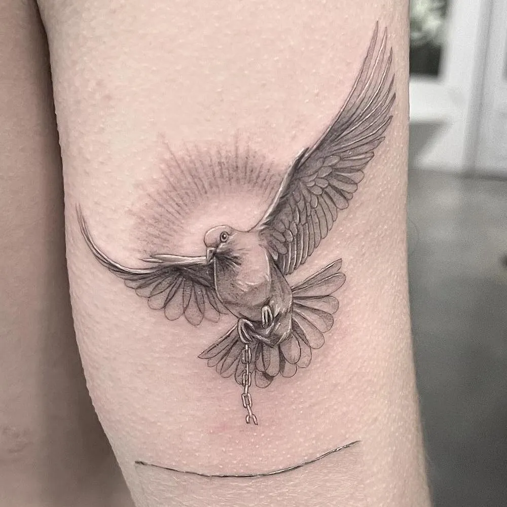 Dove tattoo Micro realism on the arm