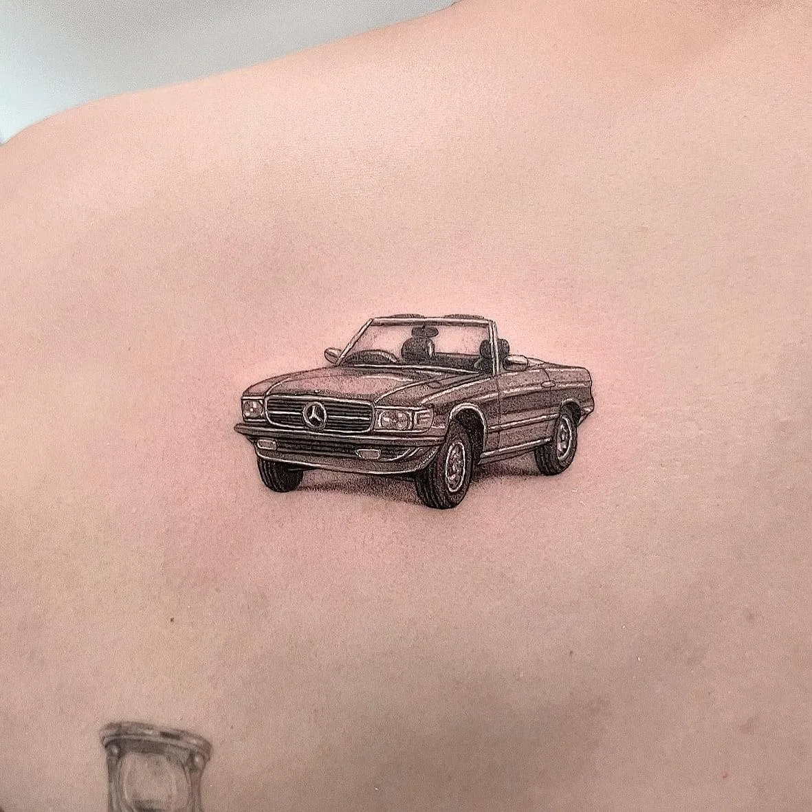 Micro realism car tattoo