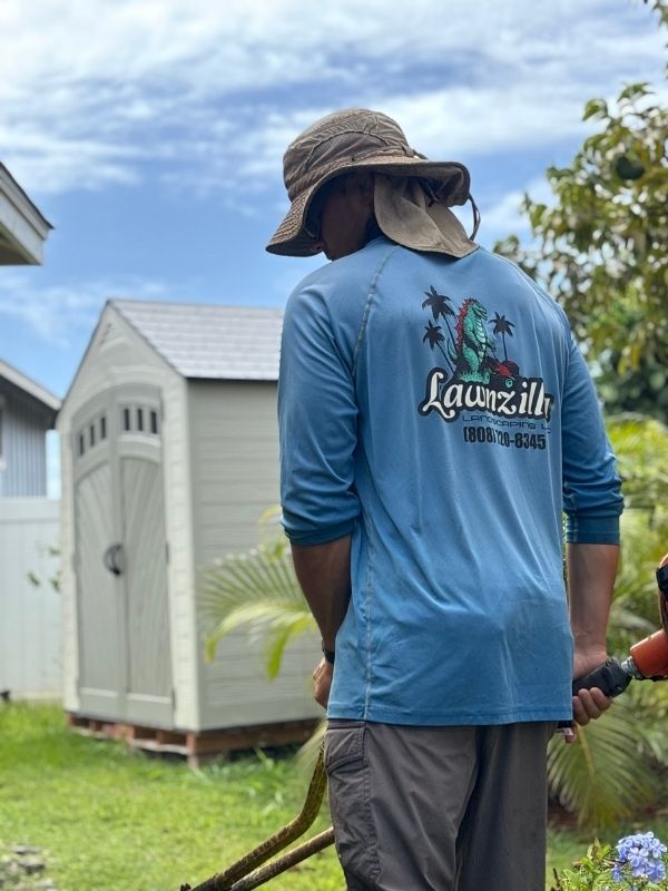 Professional yard debris removal services by Lawnzilla Landscaping LLC in Lihue, HI