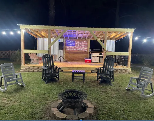 Cozy, sunlit interior of Whispering Willow Cottage living room with minimalist decor and natural light.