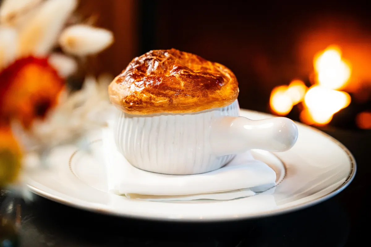 A product photography image of a pie, taken in the restaurant of The Vancouver Club.
