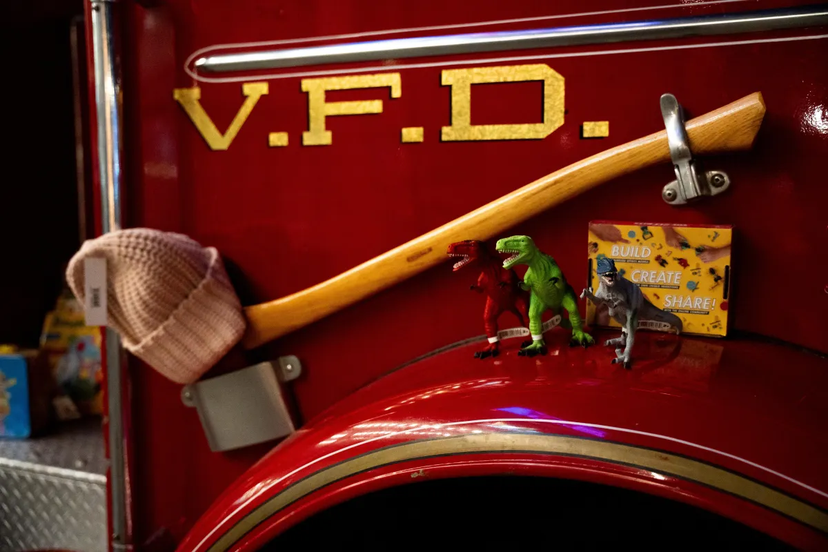 A photo of some kids toys on a fire truck at Vancouver Fire Departments annual toy drive supported by CBC. 