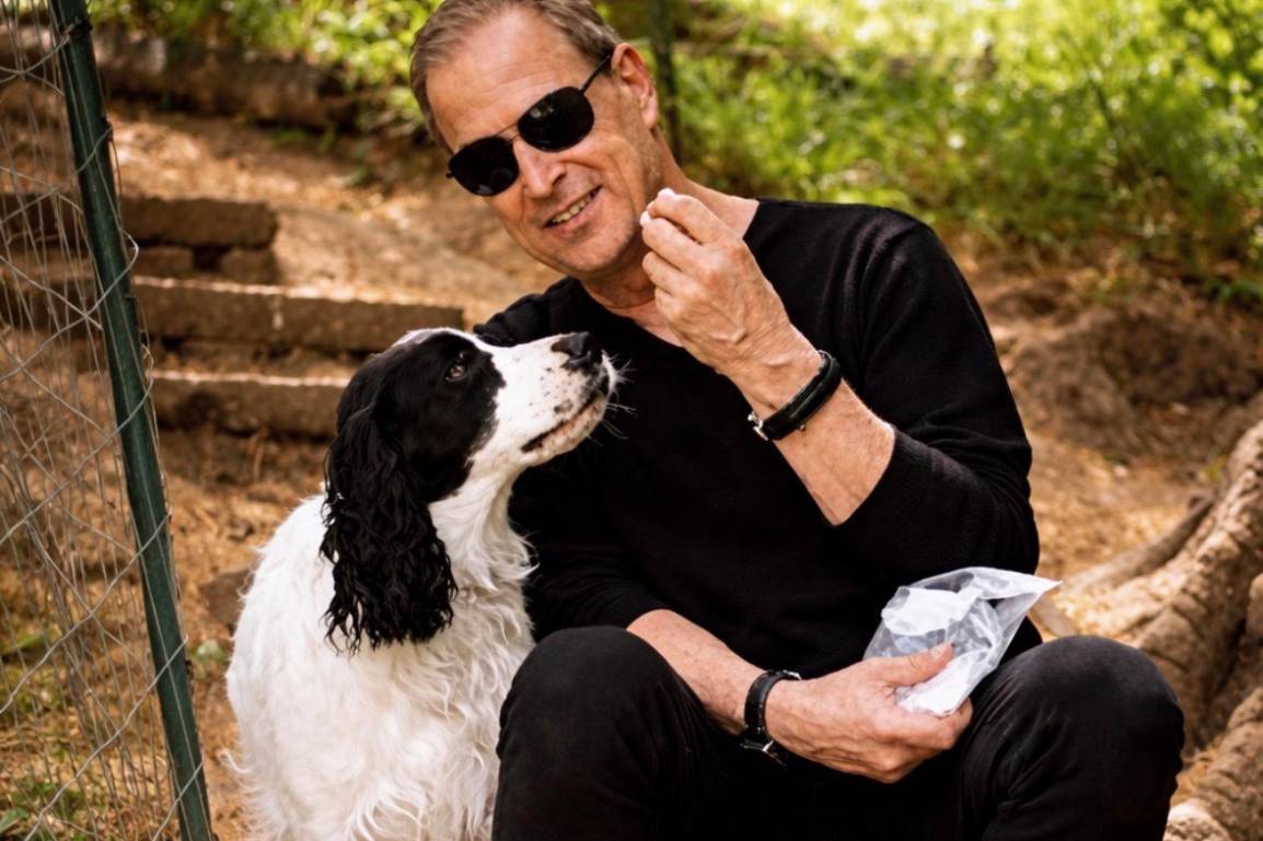 Dog trainer, Eric Dorfman with a non-aggressive dog