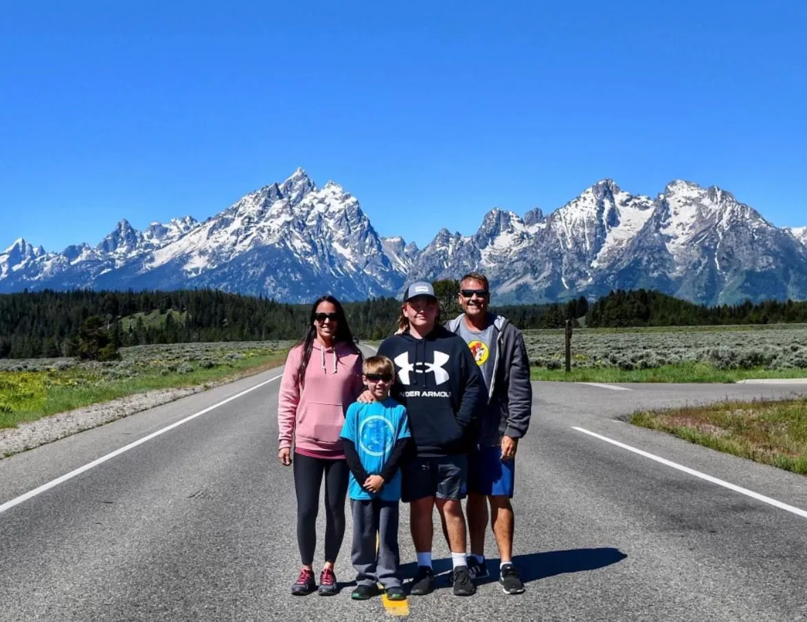 Jcob Merrifield and family photo with mountain scenery in backgrond