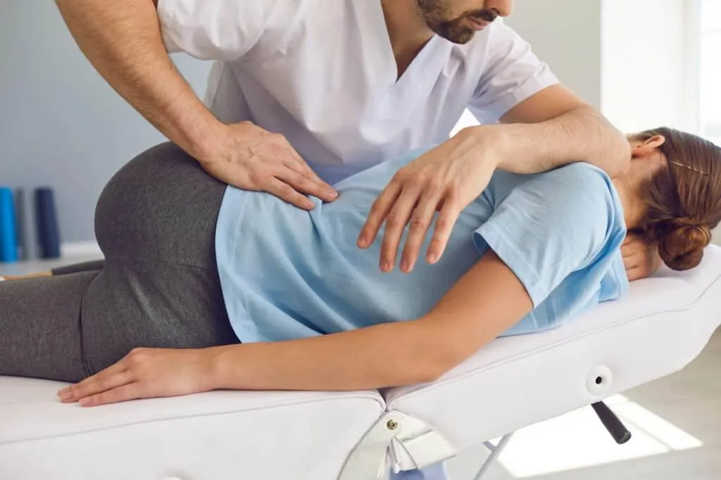 Chiropractor giving a back alignment