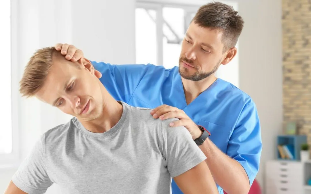 Chiropractor performing a neck alignment