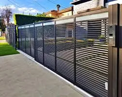 Black Metallic Ornamental Sing Gate Entrance to a High End Residential Property