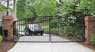 Black Metallic Ornamental Sing Gate Entrance to a High End Residential Property