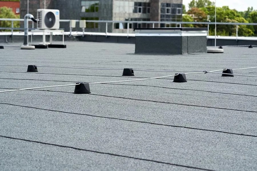 Picture of the roof of a commercial building. Flat and brand new.