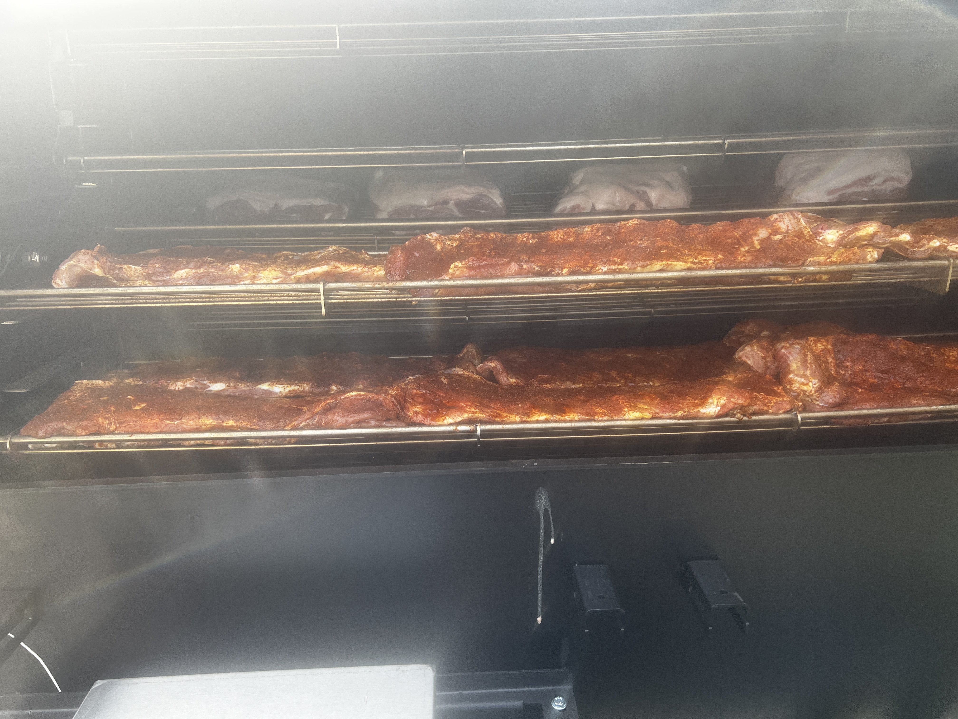 2 Racks of Ribs Cooking in an Industrial Oven