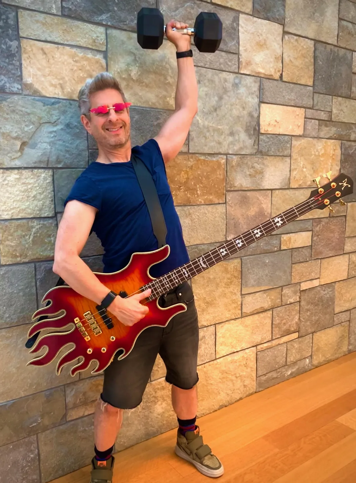 Man meditating in lotus pose on yoga mat