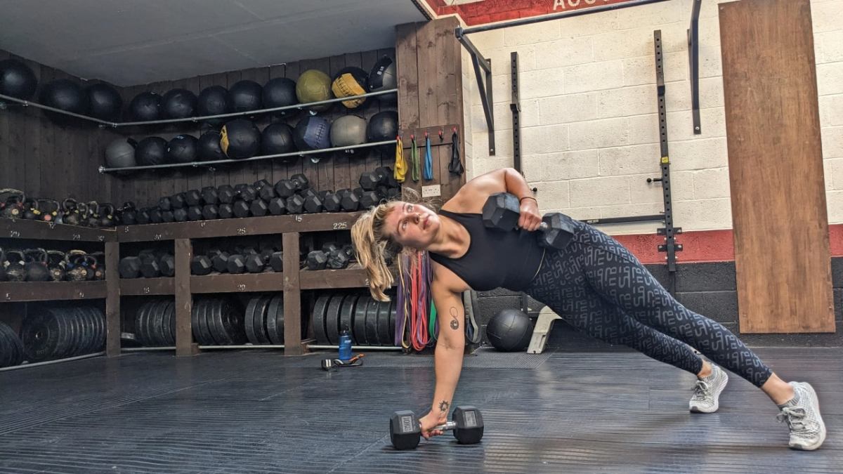 Man wearing vr headset under a bridge