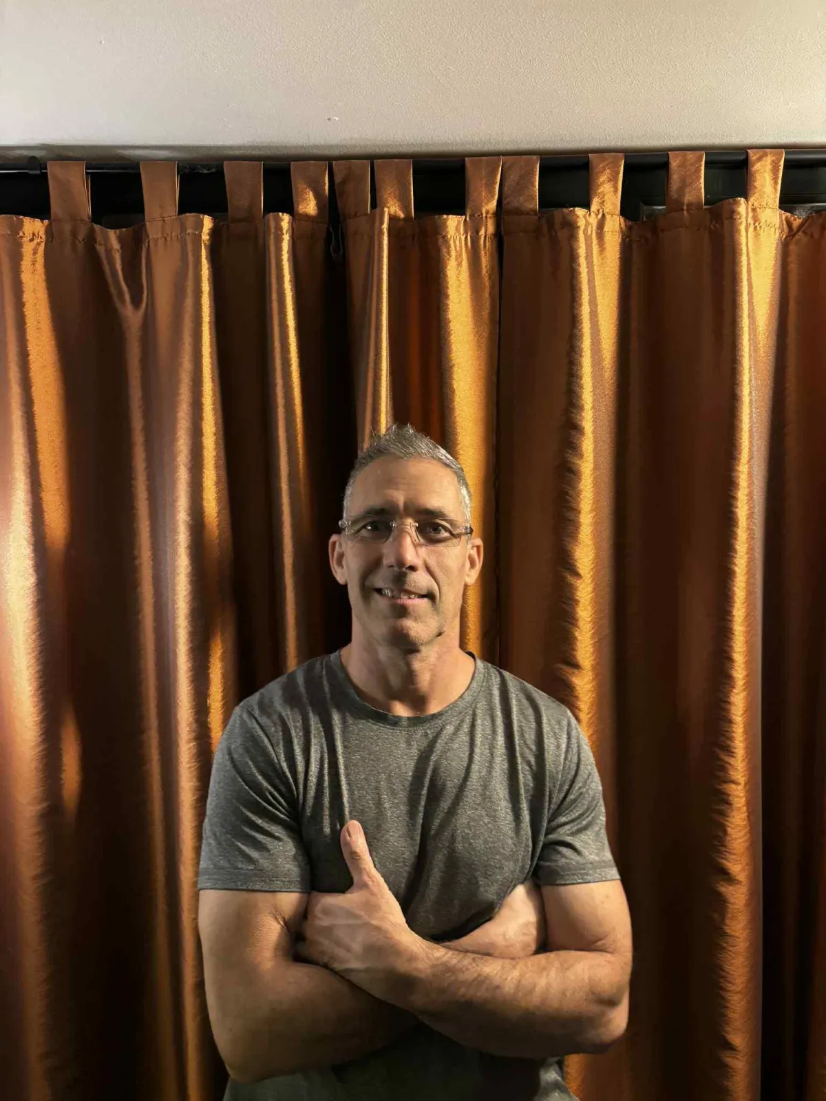 A minimalist bedroom with a futon.